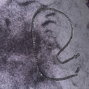 #4.. Non branded silver plated 49” chain strap.